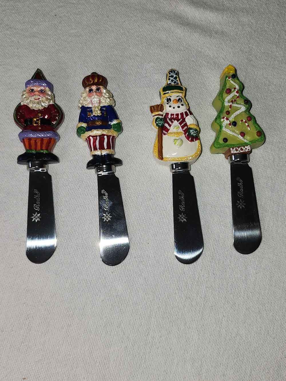 Christopher Radko Holiday Character Bottle Stoppers in Red, Green, White, Yellow